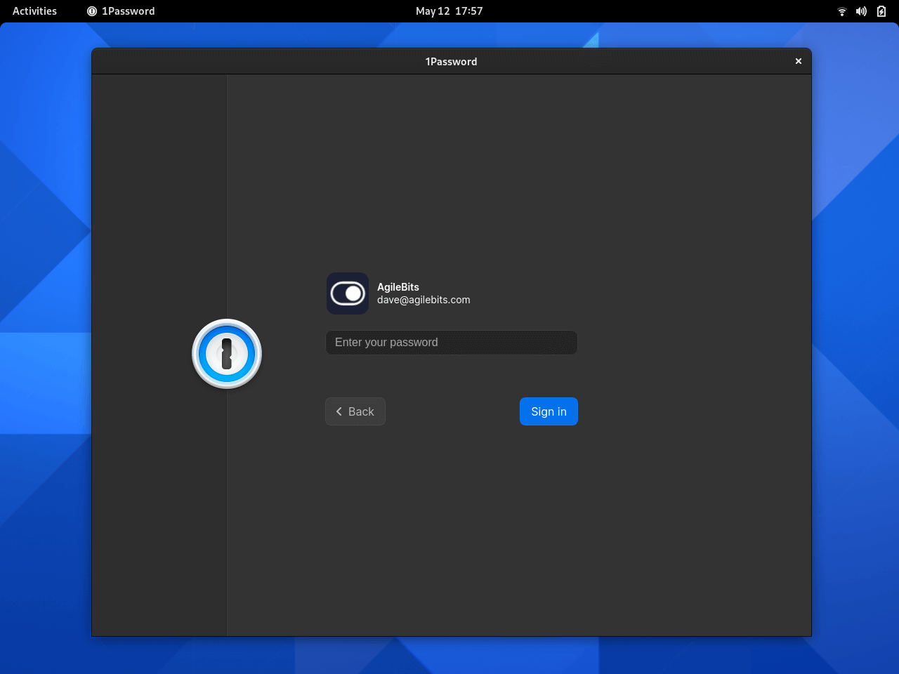 Dark themed 1Password lock screen running in Gnome desktop environment