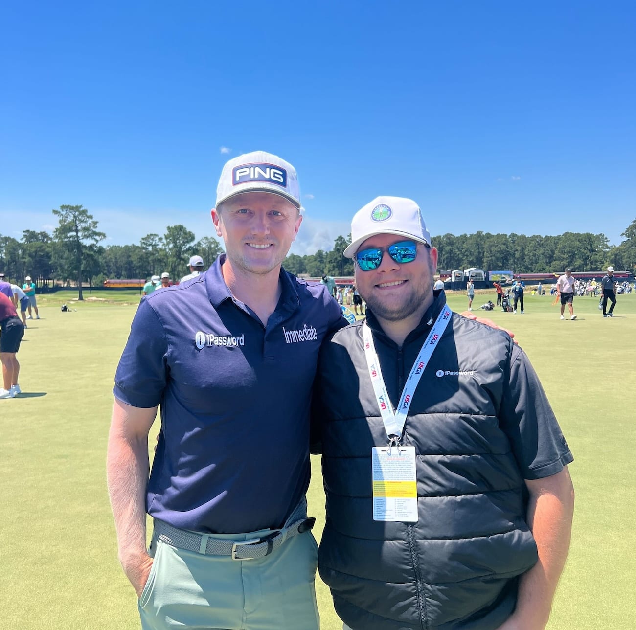 Professional golfer Mackenzie Hughes (left) and Blake Brandon of 1Password (right).