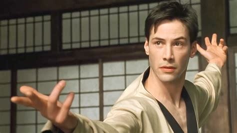 A photo of Keanue Reeves in the Matrix.