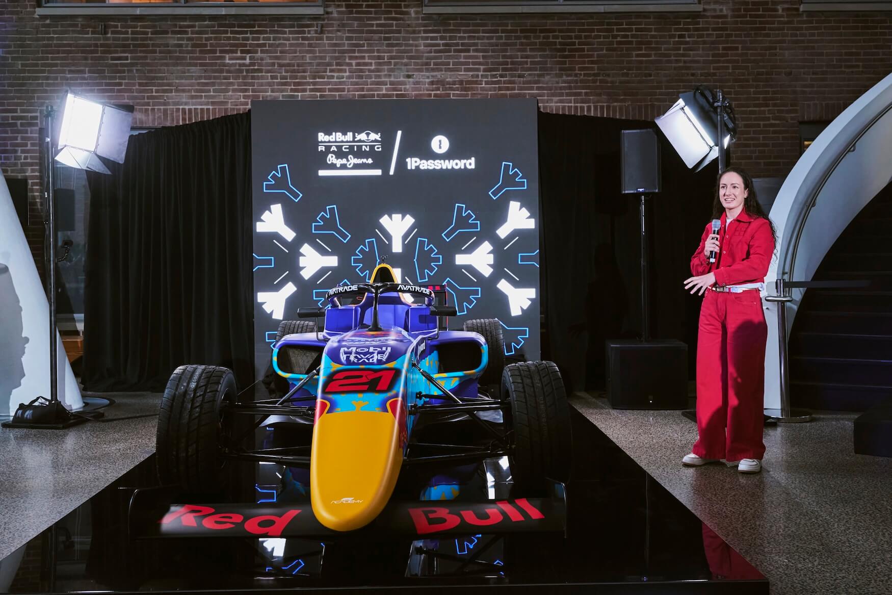 A photo of Alisha Palmowski speaking to the crowd after unveiling the livery design. A photo of Alisha Palmowski speaking to the crowd after unveiling the livery design.