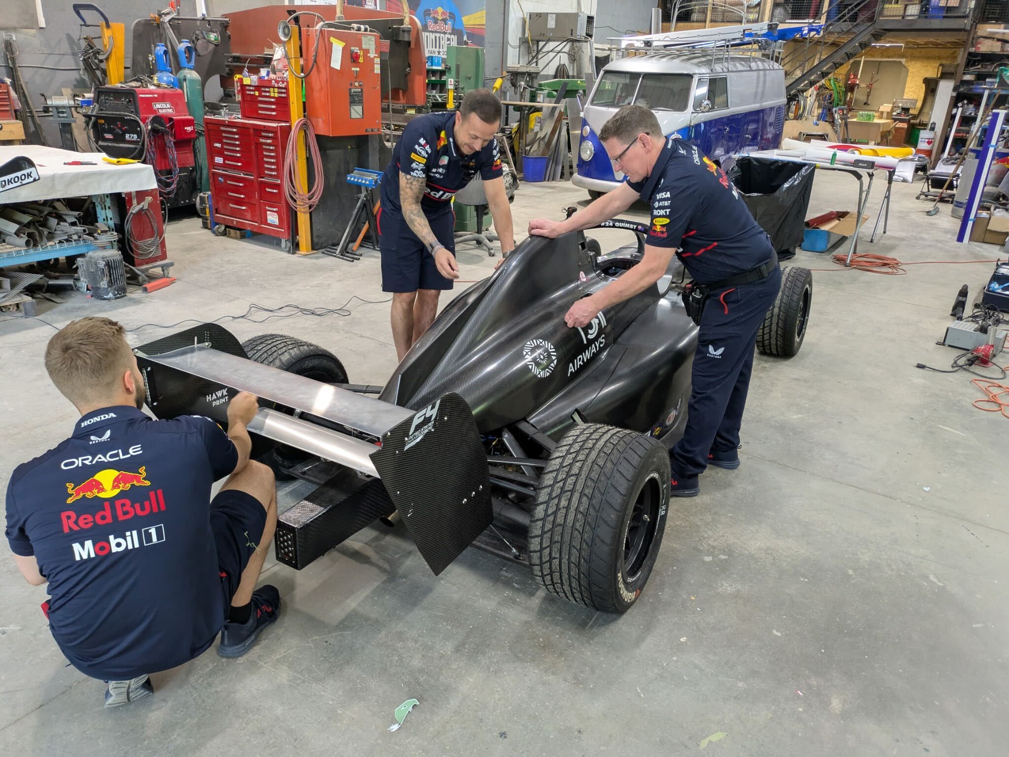 A photo of the car being prepared to be wrapped in the new livery design. A photo of the car being prepared to be wrapped in the new livery design.